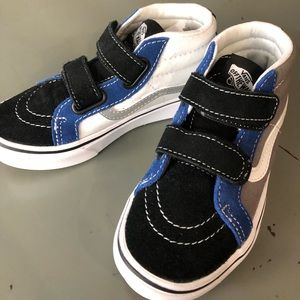 Vans high top boys.  Brand New - never worn.  Velcro closure.